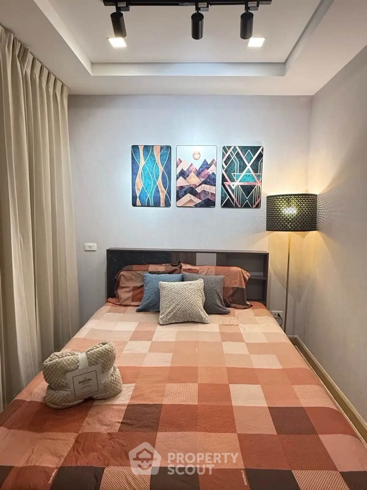Cozy bedroom with modern decor and stylish lighting