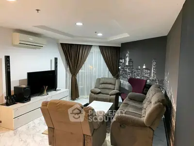 Stylish living room with cozy seating and cityscape wall art, perfect for modern urban living.