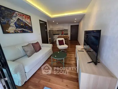 Modern living room with stylish decor and open kitchen layout