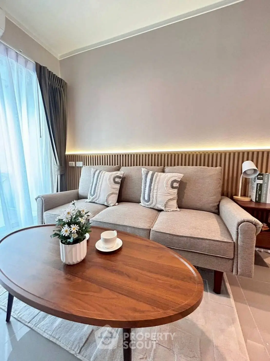 Stylish living room with modern sofa and elegant coffee table