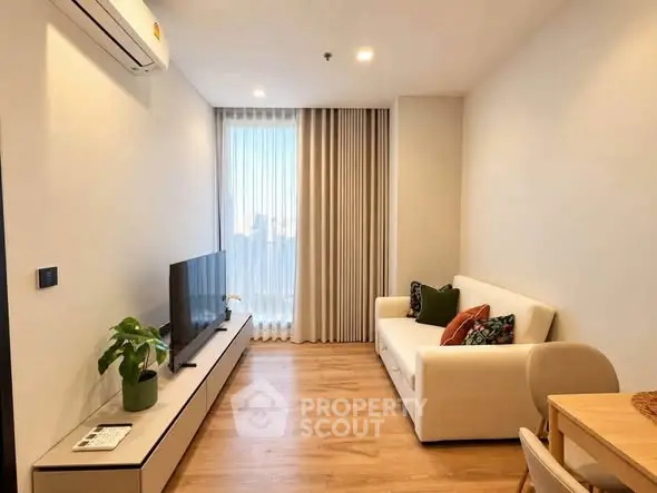 Modern living room with sleek design and natural light