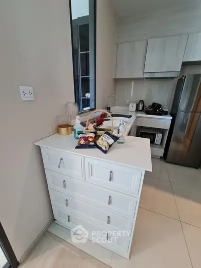 Modern kitchen with sleek cabinetry and stainless steel appliances