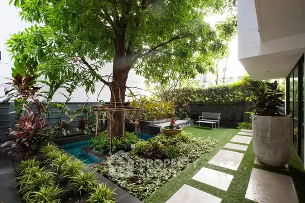 Lush garden with modern landscaping and serene seating area