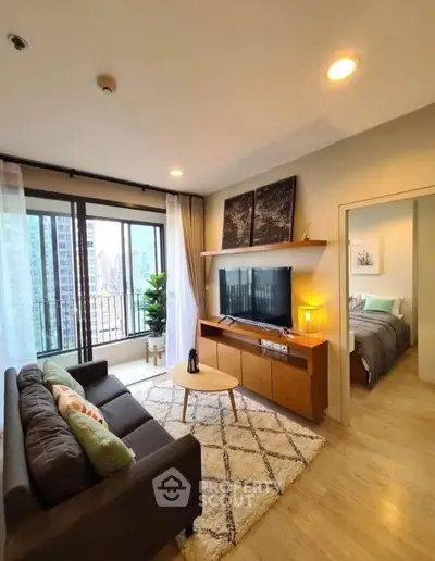 Modern living room with cozy sofa, stylish decor, and city view balcony in urban apartment.