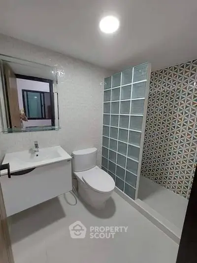 Modern bathroom with sleek fixtures and stylish tile design