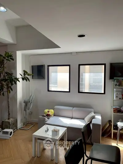 Cozy living room with natural light and modern decor