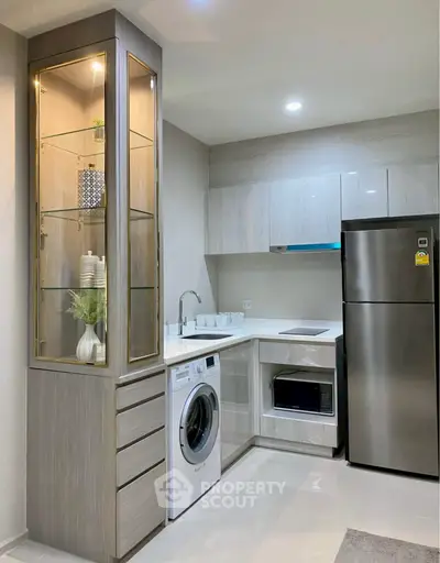 Modern kitchen with sleek appliances and stylish cabinetry