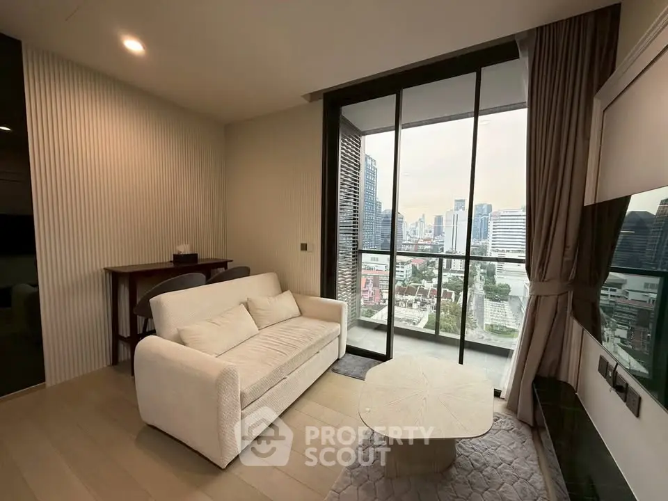 Modern living room with city view and large balcony in luxury apartment
