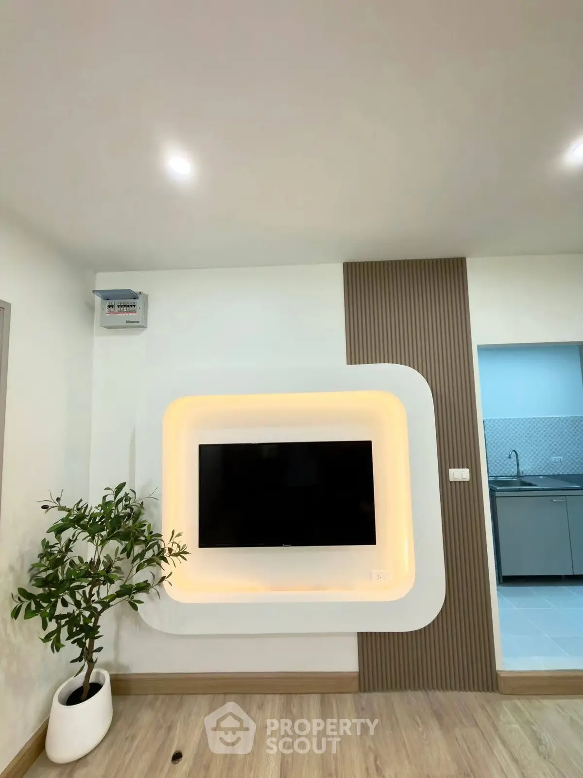 Modern living room with stylish TV wall mount and elegant decor