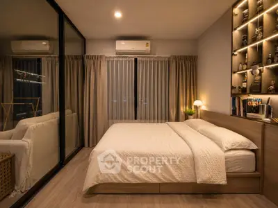Modern bedroom with cozy lighting and stylish decor, featuring a comfortable bed and elegant shelving.