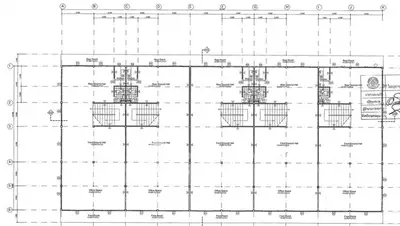 Architectural floor plan showcasing detailed layout of multi-unit building.