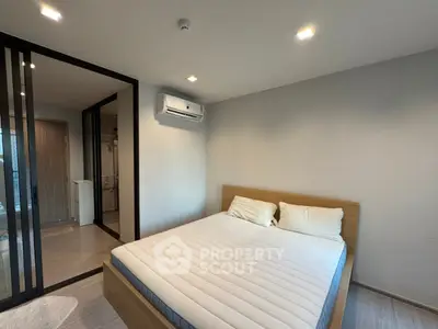 Modern bedroom with minimalist design and ensuite bathroom