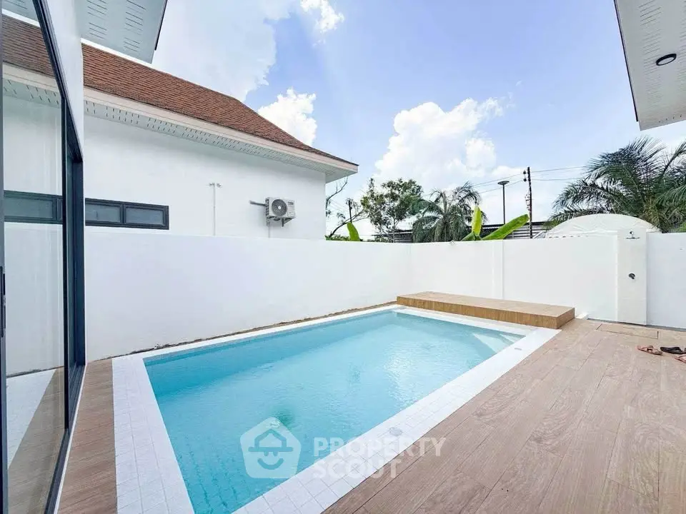 Charming private pool area with modern design and serene ambiance, perfect for relaxation and entertainment.