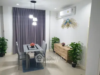 Modern dining area with elegant decor and air conditioning
