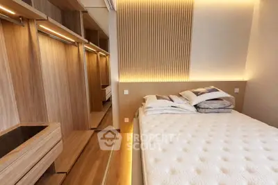 Luxurious bedroom with modern wooden accents and ambient lighting, featuring a cozy bed and spacious walk-in closet.