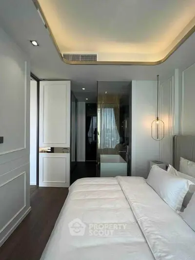 Luxurious modern bedroom with elegant lighting and stylish decor