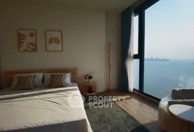 Luxurious bedroom with stunning ocean view and modern decor