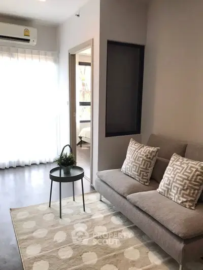 Modern living room with stylish decor and natural light