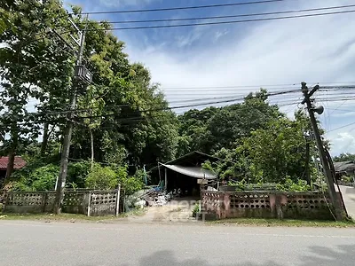 Charming rural property with lush greenery and rustic appeal, perfect for nature lovers seeking tranquility.