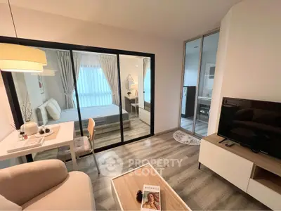 Modern studio apartment with cozy living area and stylish bedroom