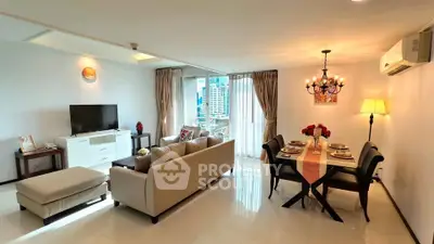 Spacious modern living room with dining area and city view balcony