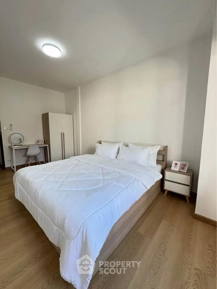 Modern bedroom with cozy bed and minimalist decor