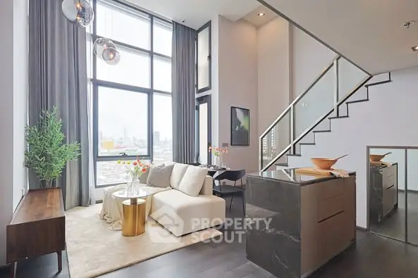 Luxurious modern living room with high ceilings and city view