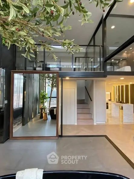 Luxurious modern interior with mezzanine and stylish decor