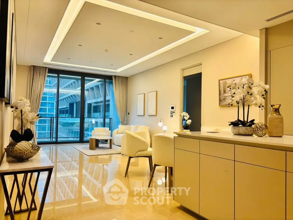 Luxurious modern living room with elegant decor and stunning city view through large windows.