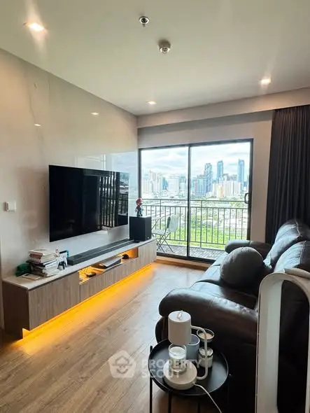 Modern living room with city view, sleek furniture, and ambient lighting