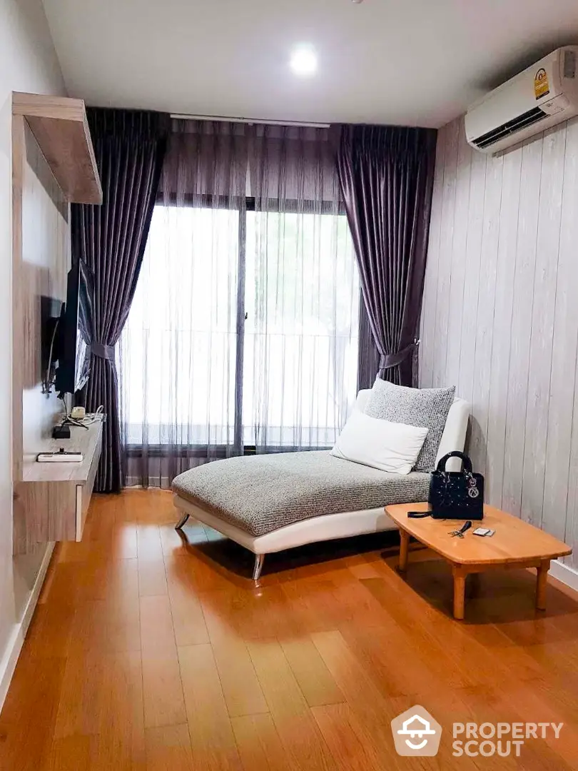  1 Bedroom Condo at Condolette Dwell Sukhumvit 26 Livingroom