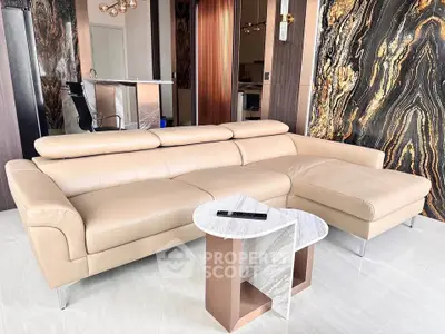 Luxurious modern living room with elegant beige sofa and marble side table