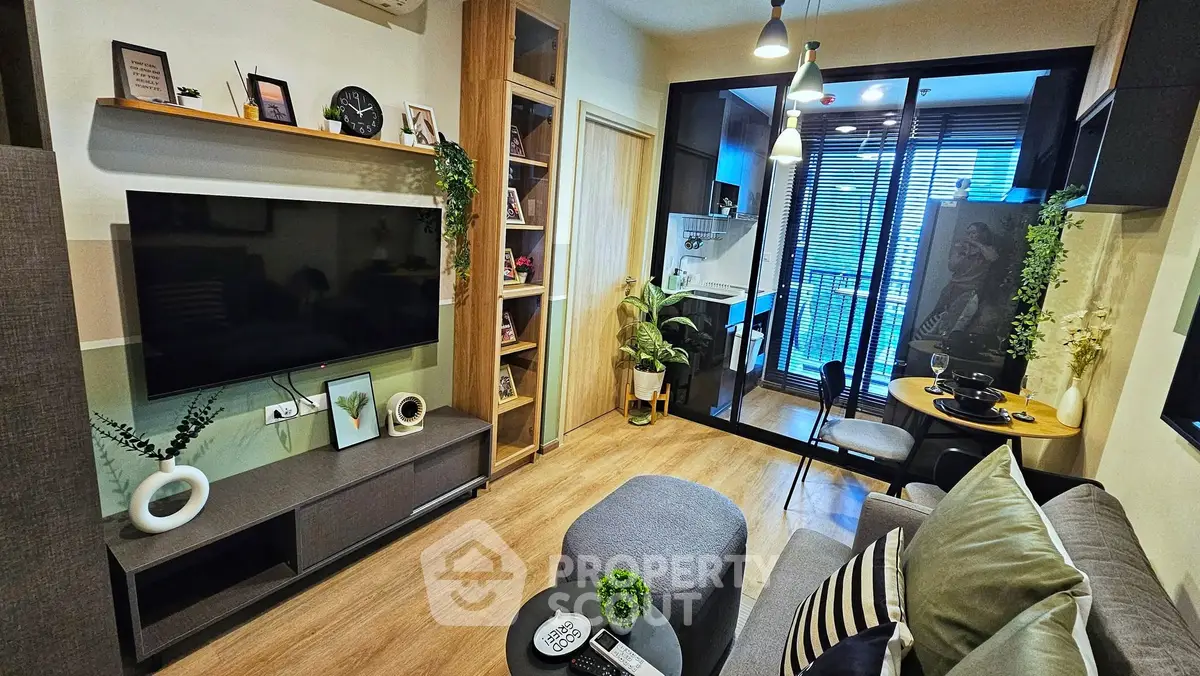 Modern living room with stylish decor and balcony view