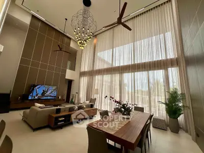 Luxurious modern living room with high ceilings and elegant decor