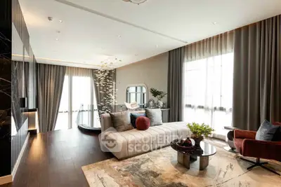 Luxurious modern living room with elegant decor and large windows