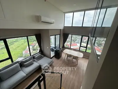 Stunning corner unit with panoramic city views and spacious living area, perfect for modern urban living.