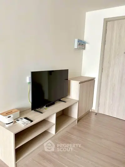 Modern living room with sleek TV stand and minimalist decor