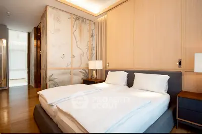 Luxurious bedroom with elegant decor and ambient lighting, featuring a comfortable double bed and stylish wooden accents.
