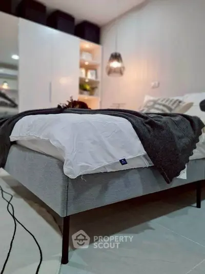 Modern bedroom with stylish decor and cozy ambiance