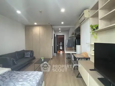 Modern living room with stylish furniture and open layout in a contemporary apartment.