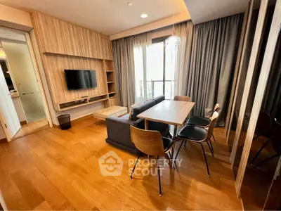 Modern living room with wooden flooring and stylish furniture