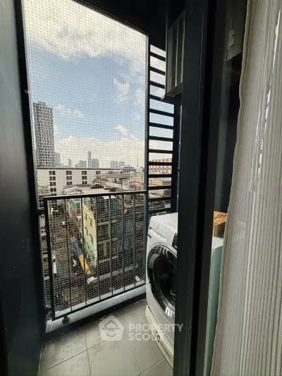 Urban balcony with city view and washing machine, perfect for modern living.