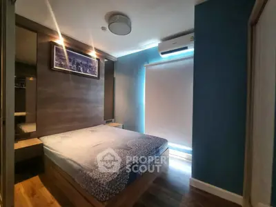 Modern bedroom with stylish decor and natural light