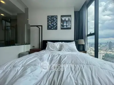 Luxurious bedroom with stunning city view and modern decor