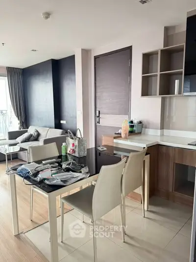 Modern open-plan living room with stylish furniture and natural light