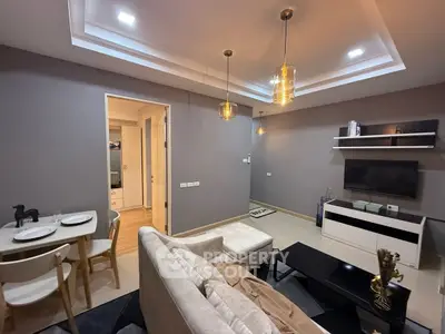 Modern living room with stylish decor and cozy dining area