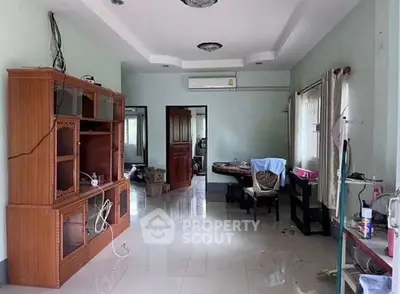 Spacious living room with wooden furniture and modern decor