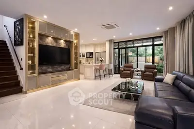 Luxurious modern living room with open kitchen and elegant decor