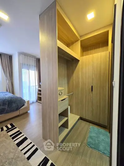 Modern bedroom with walk-in closet and stylish decor