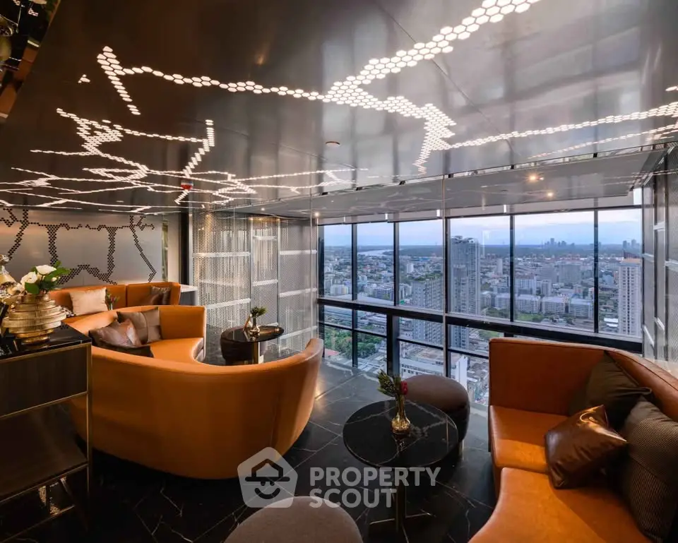 Luxurious high-rise living room with panoramic city views and modern decor